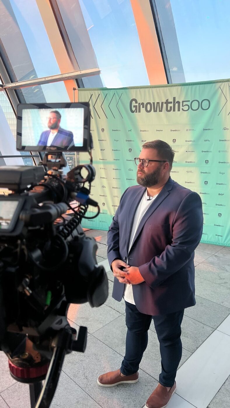 Shaun Prime on stage at the Business Leader Summit